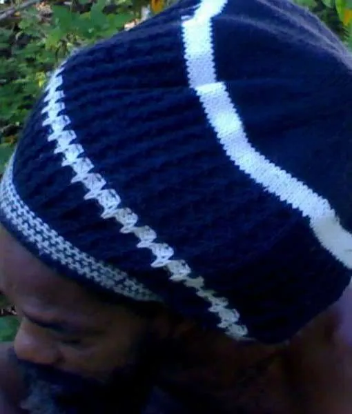 Maori Tam in black and white pure Australian wool. Handknitted in unique and vibrant design for your dreadlocks.