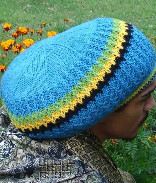 Rastaman Jamaica Blue Wool Tam handknitted in luscious blue pure Australian merino wool with Jamaican color trim at Rasta Gear Shop.