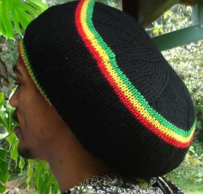 Rasta black stocking stitch tam handknitted in pure Australian merino wool. Rastafarian accent colors.