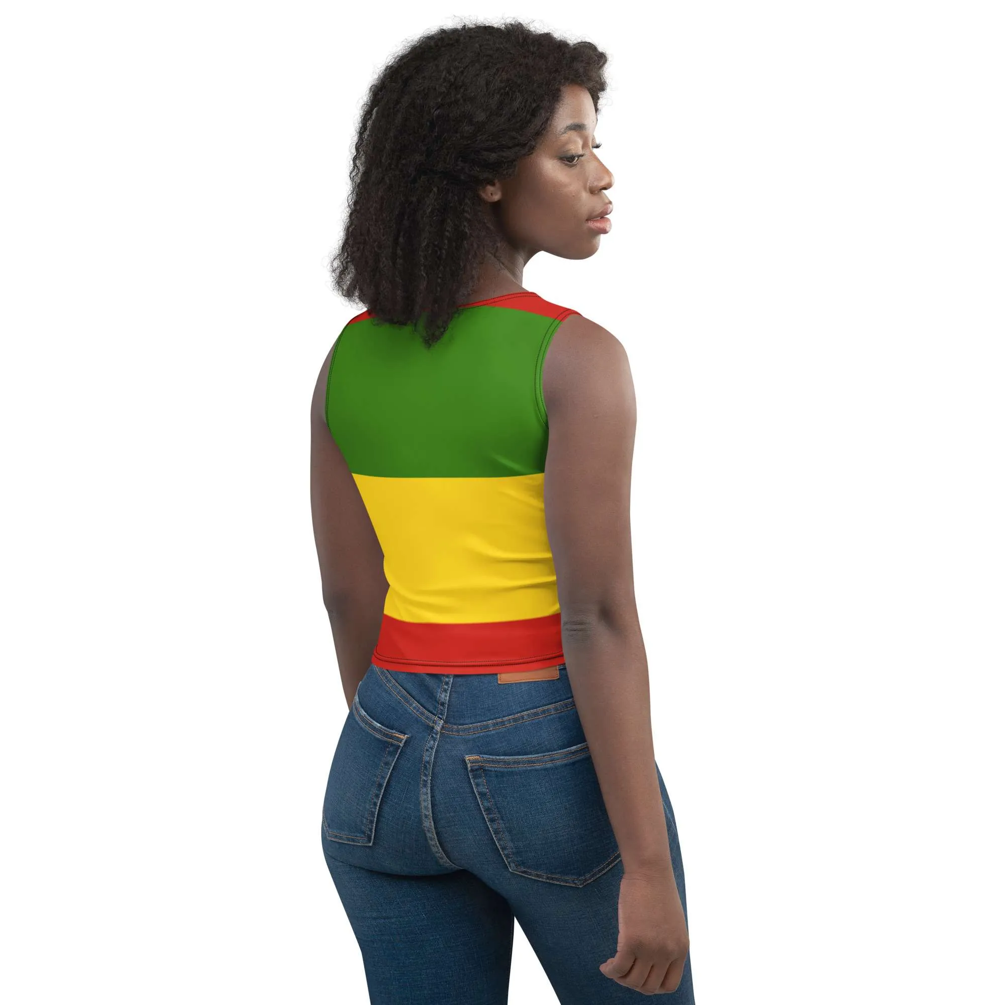 Conquering Lion of Judah Crop Top female model right side back view in red gold and green four way stretch comfortable microfibre fabric. Rastaseed Rastafarian merchandise.