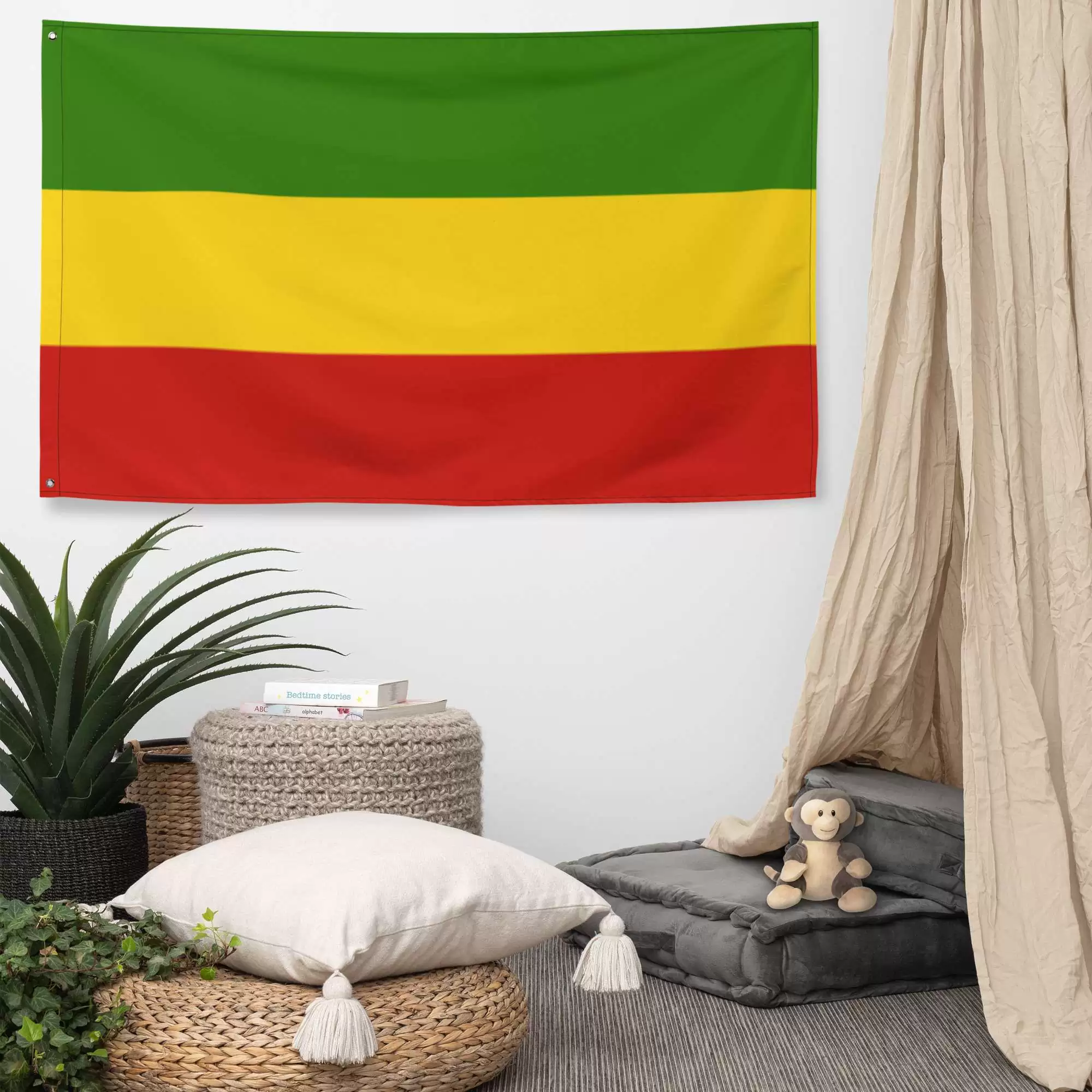 Rasta Flag in Red Gold and Green shown on the wall. Quality ensign to fly with joy. Original merchandise from Rastaseed online clothing store and blog.