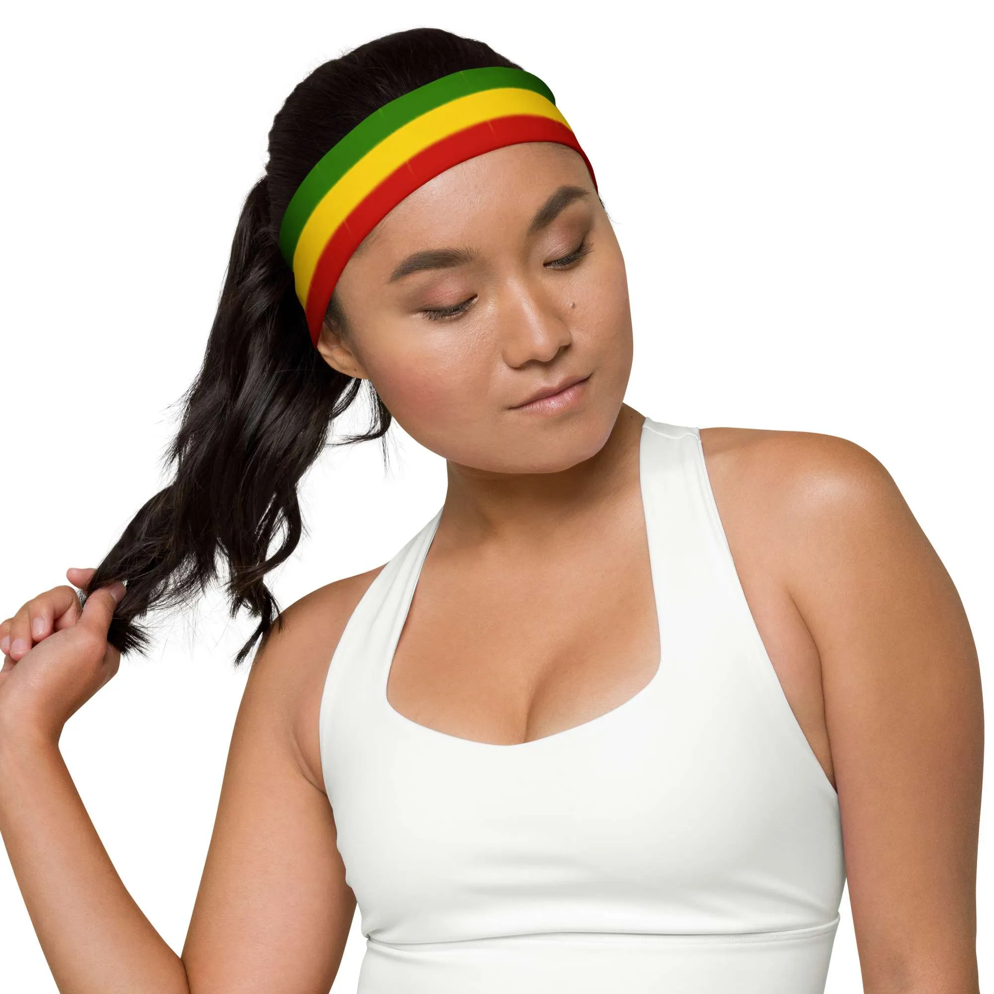 Rasta Headband female front view in the Rastafarian colors made from soft stretch fabric. Make a statement with merchandise from Rastaseed.com