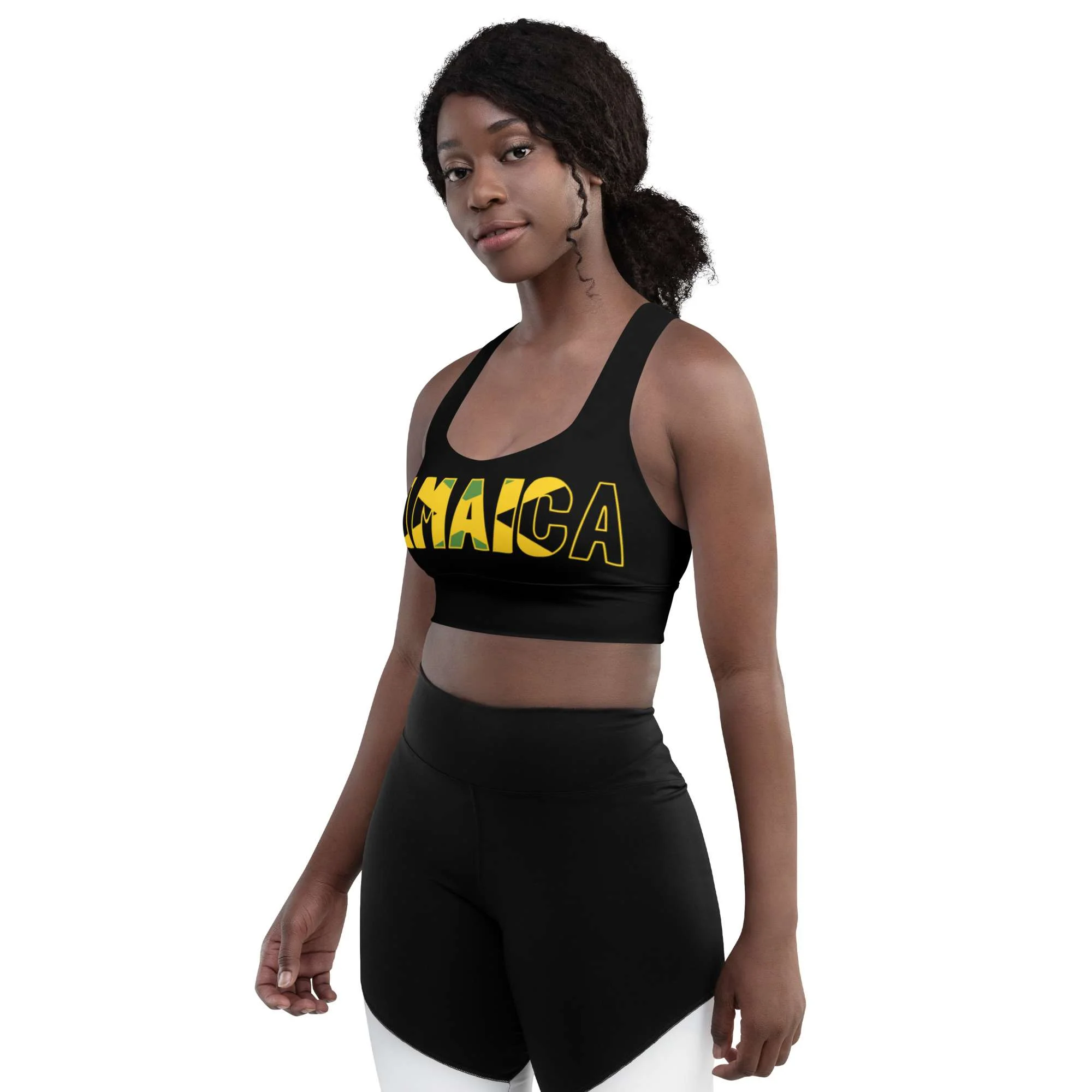 Jamaican Longline sports bra female model front side view in compression fabric with sports mesh lining. Double layered front and shoulder straps for exercising.