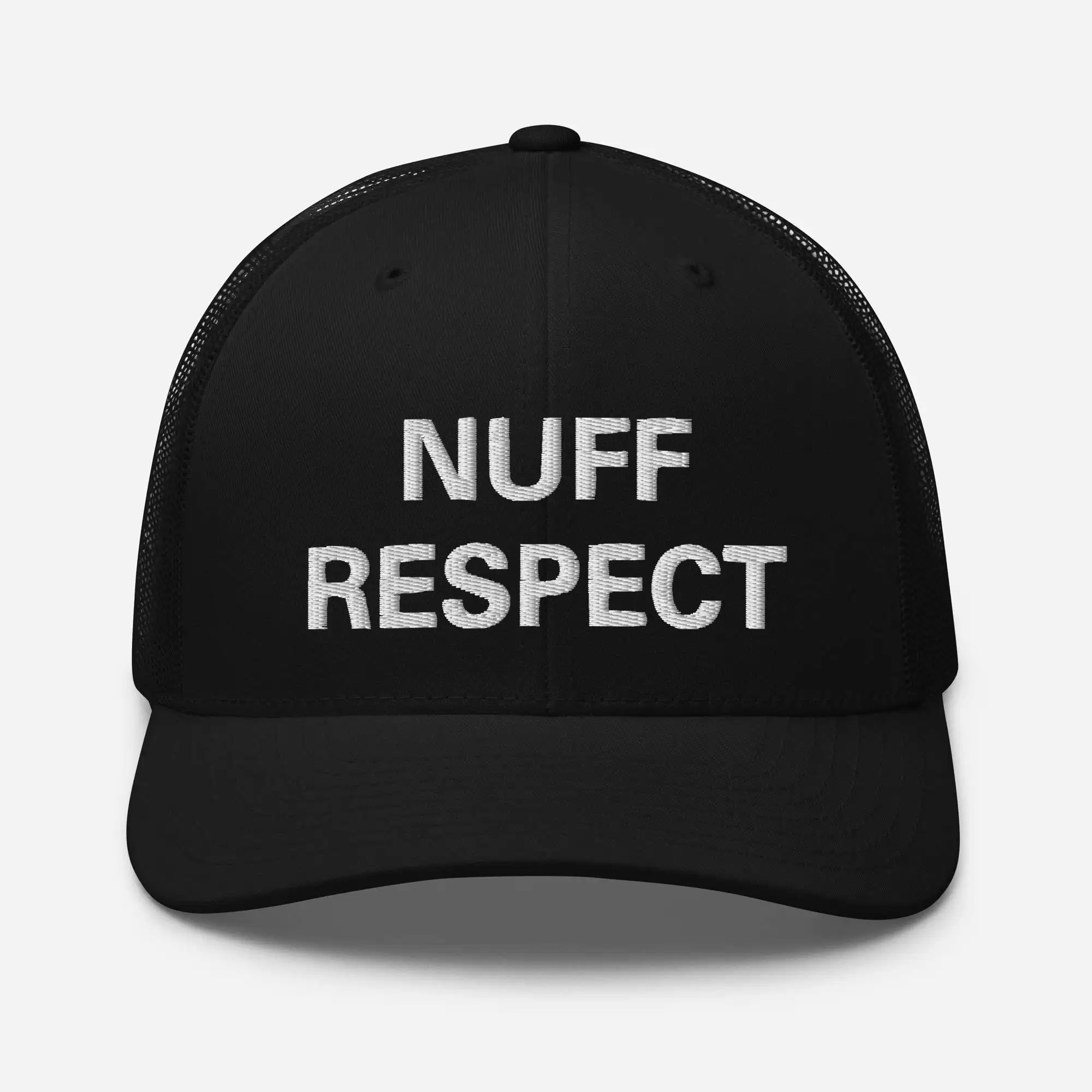 Nuff Respect Jamaican Trucker Cap front view. Original embroidered Patois phrase on black trucker hat with mesh back and curved visor.