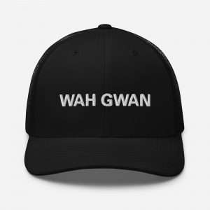 Wah Gwan Jamaican Trucker Cap front view in black with mesh back and curved visor. Awesome gear at Rastaseed online Rasta shop and clothing store.