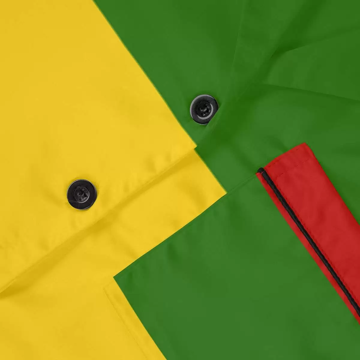 Rasta Satin Pajamas close up view in red gold and green. Silky smooth with black detail. Rastafarian Jamaican and Reggae merchandise in the Rasta colors.