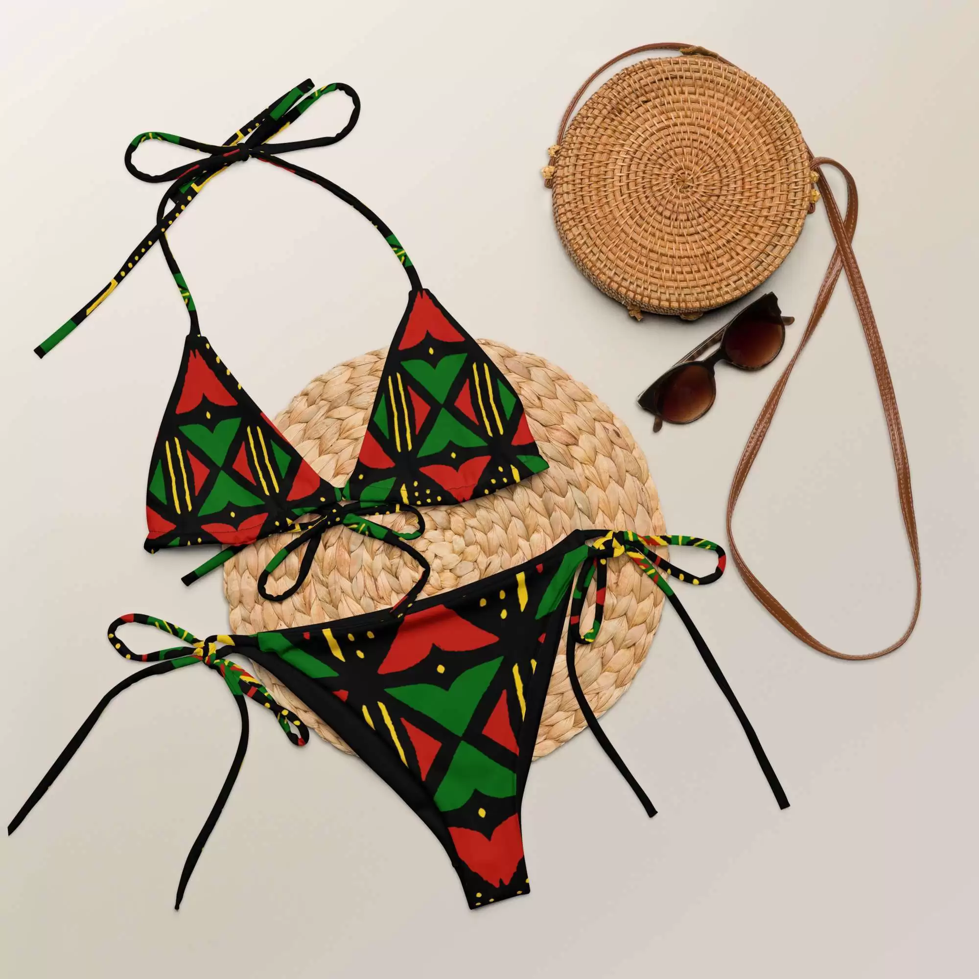 Rasta African string bikini styled flat view inspired by mud cloth in the Rasta and Afro American colors. Soft stretchy and comfortable in sizes up to 6XL
