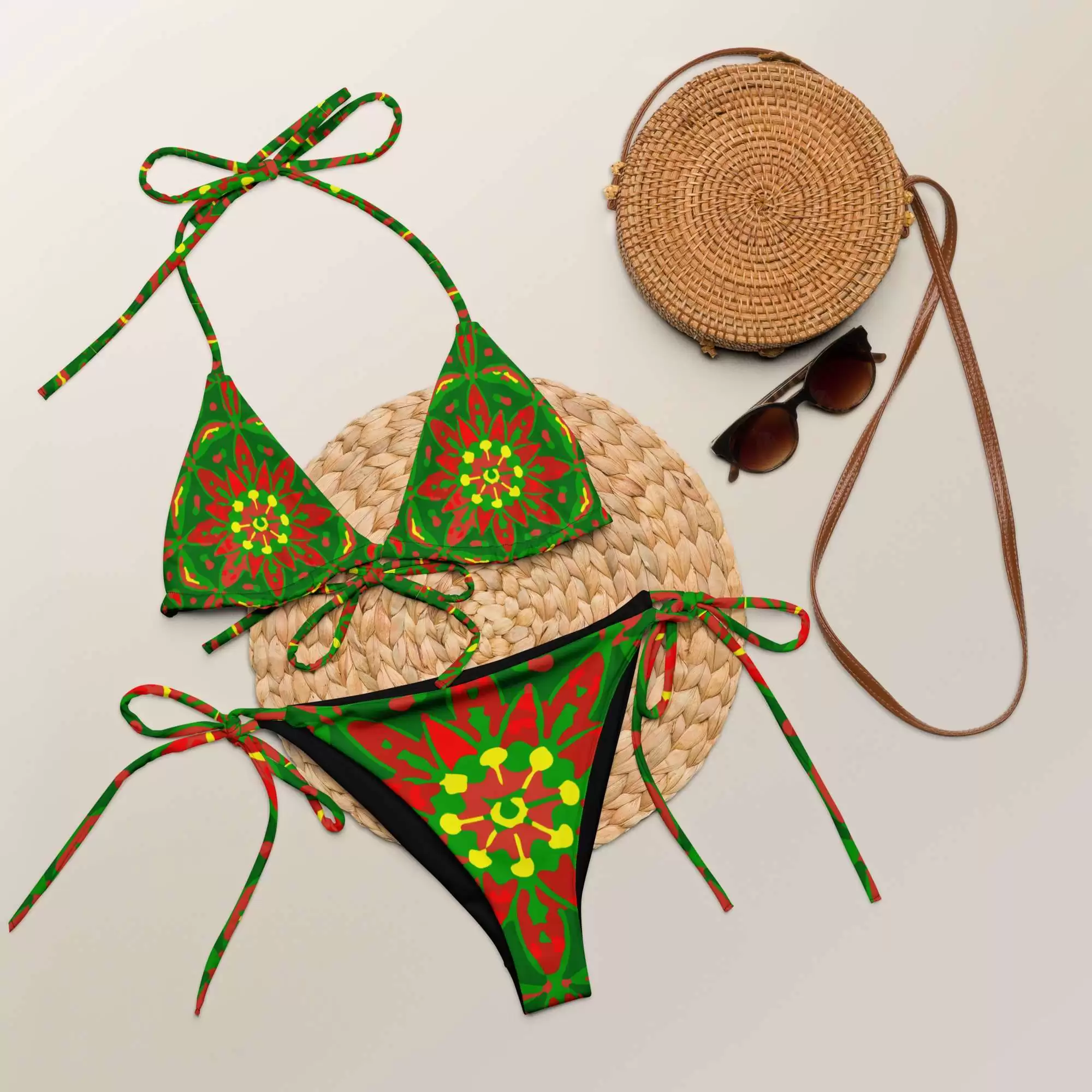 Rasta Mandala string bikini in original design styled flat view. Soft stretchy and comfortable this bikini can be styled a few ways. Sizes up to 6XL.
