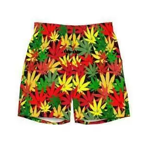Hemp Leaf Boardshorts front view in Rasta colors of red gold and green with black background and stitching. Rastafarian shop for clothing and accessories.