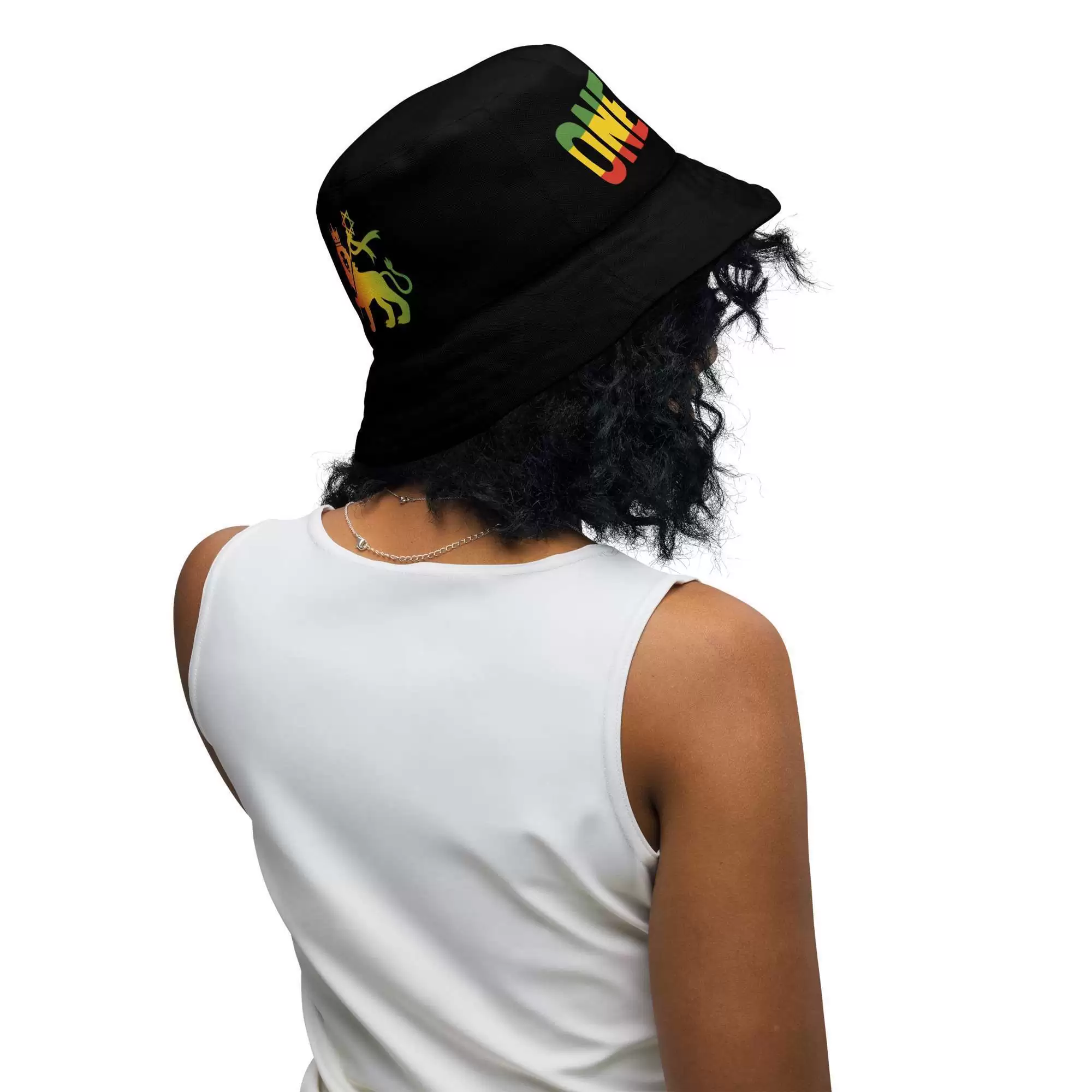 Rasta Reggae Reversible bucket hat model front inside back view with funky red gold and green design on the inside side and black one love Lion of Judah design on the inside.