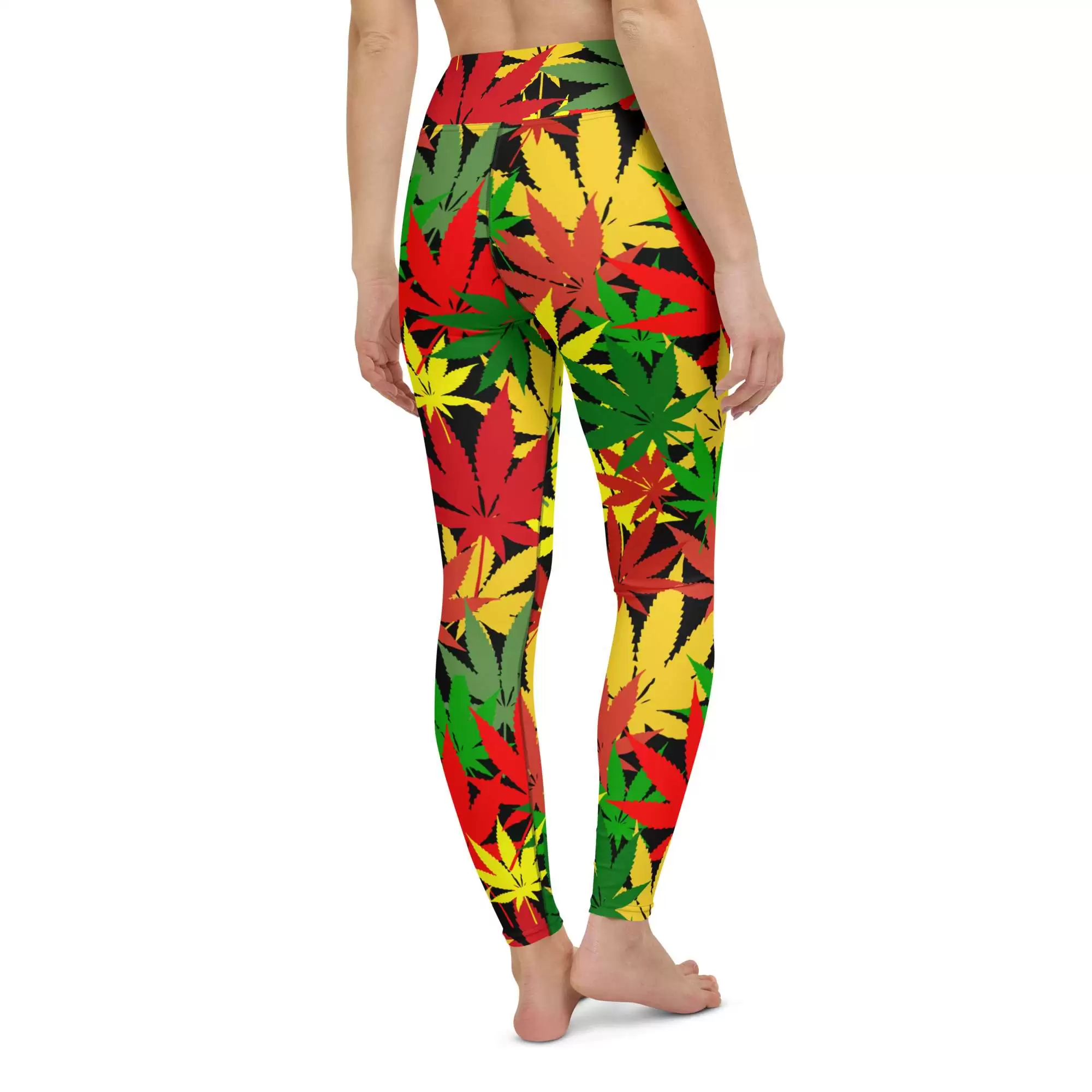 Rasta Hemp Yoga Leggings model back view are soft, stretchy and really comfortable. Hemp leaf graphic in the Rastafarian colors on black background.