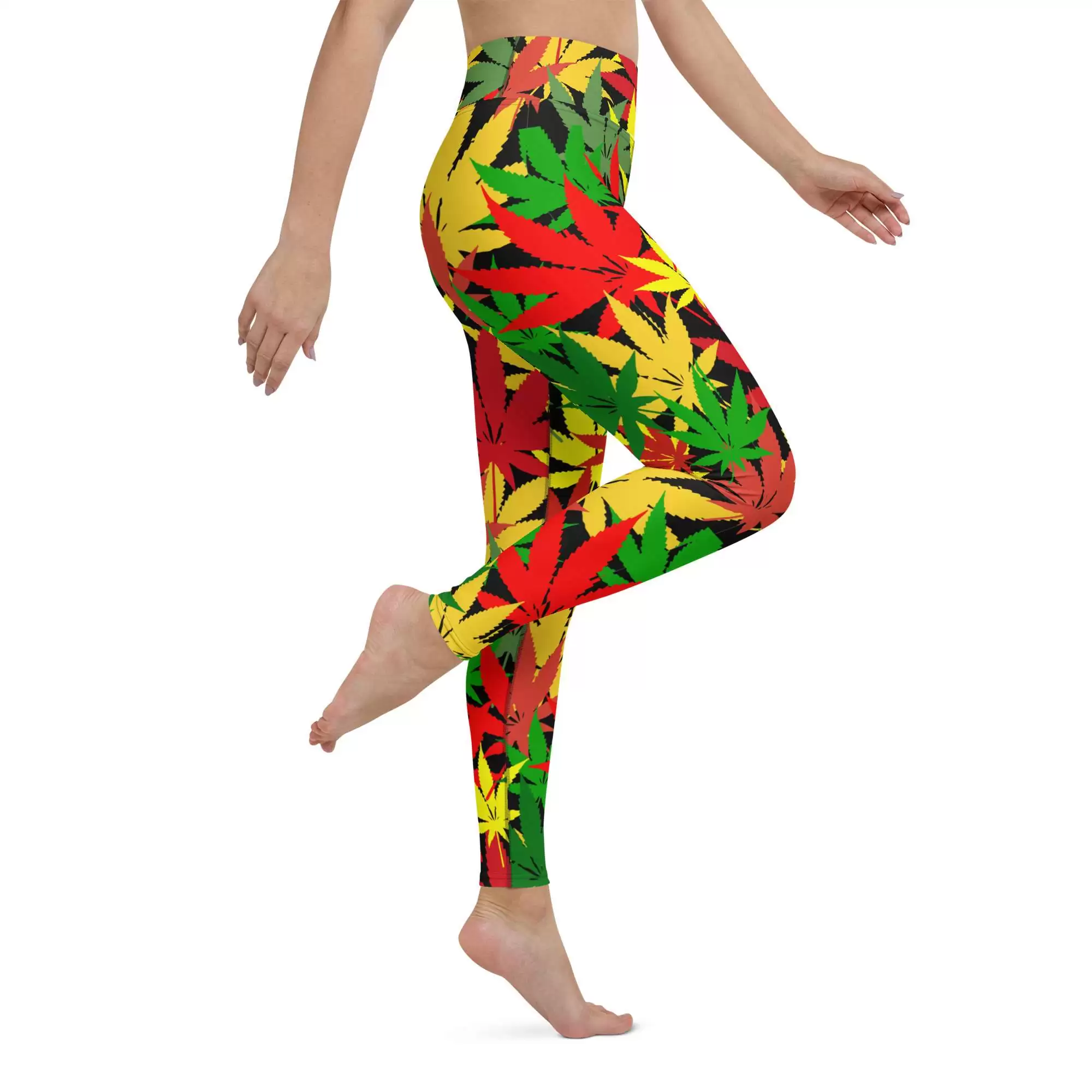 Rasta Hemp Yoga Leggings model side leg up right view are soft, stretchy and really comfortable. Hemp leaf graphic in the Rastafarian colors on black background.