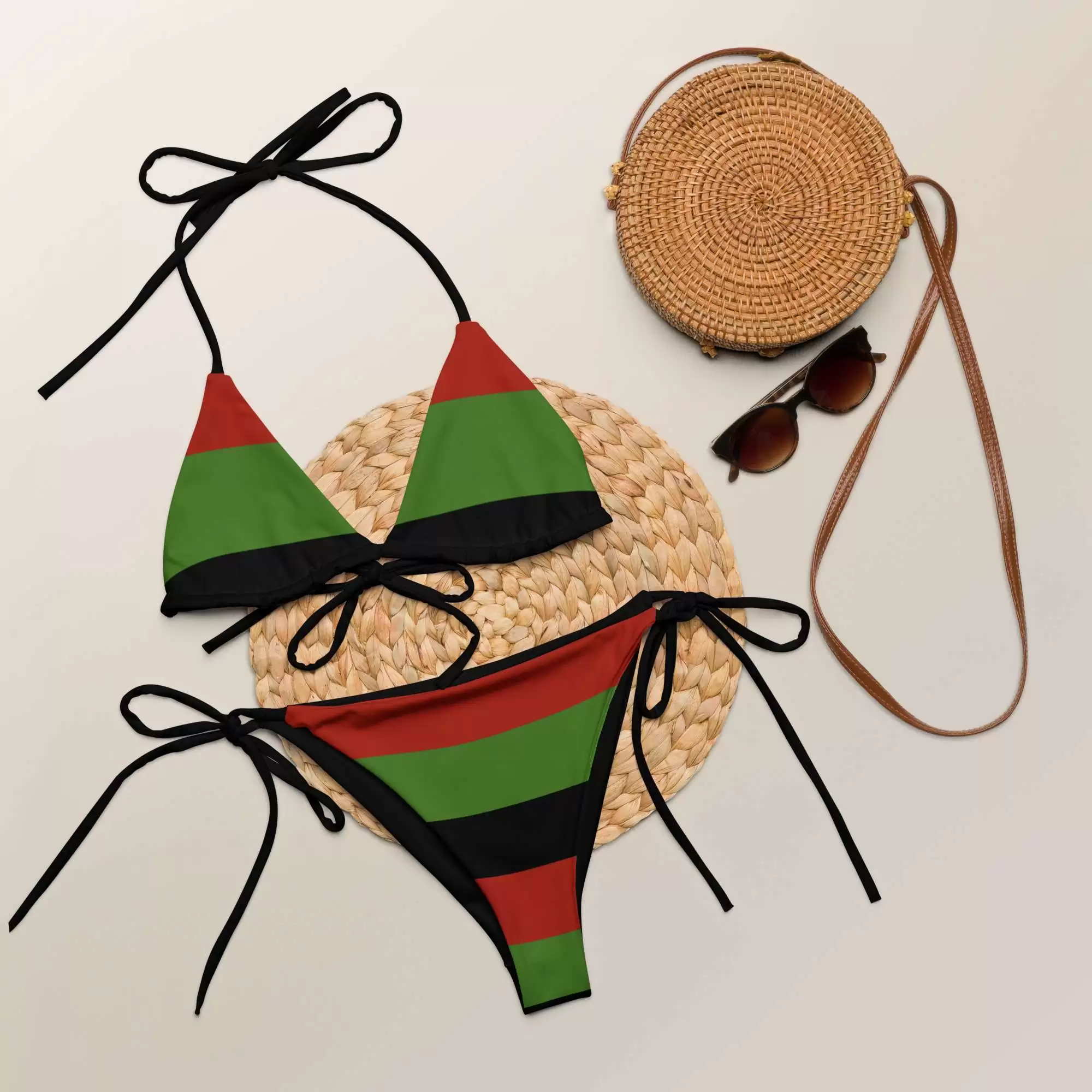 Afro American string bikini styled flat view soft and comfortable in sizes up to 6XL. Pan African Marcus Garvey colors with black lining. Original design Rastaseed.com