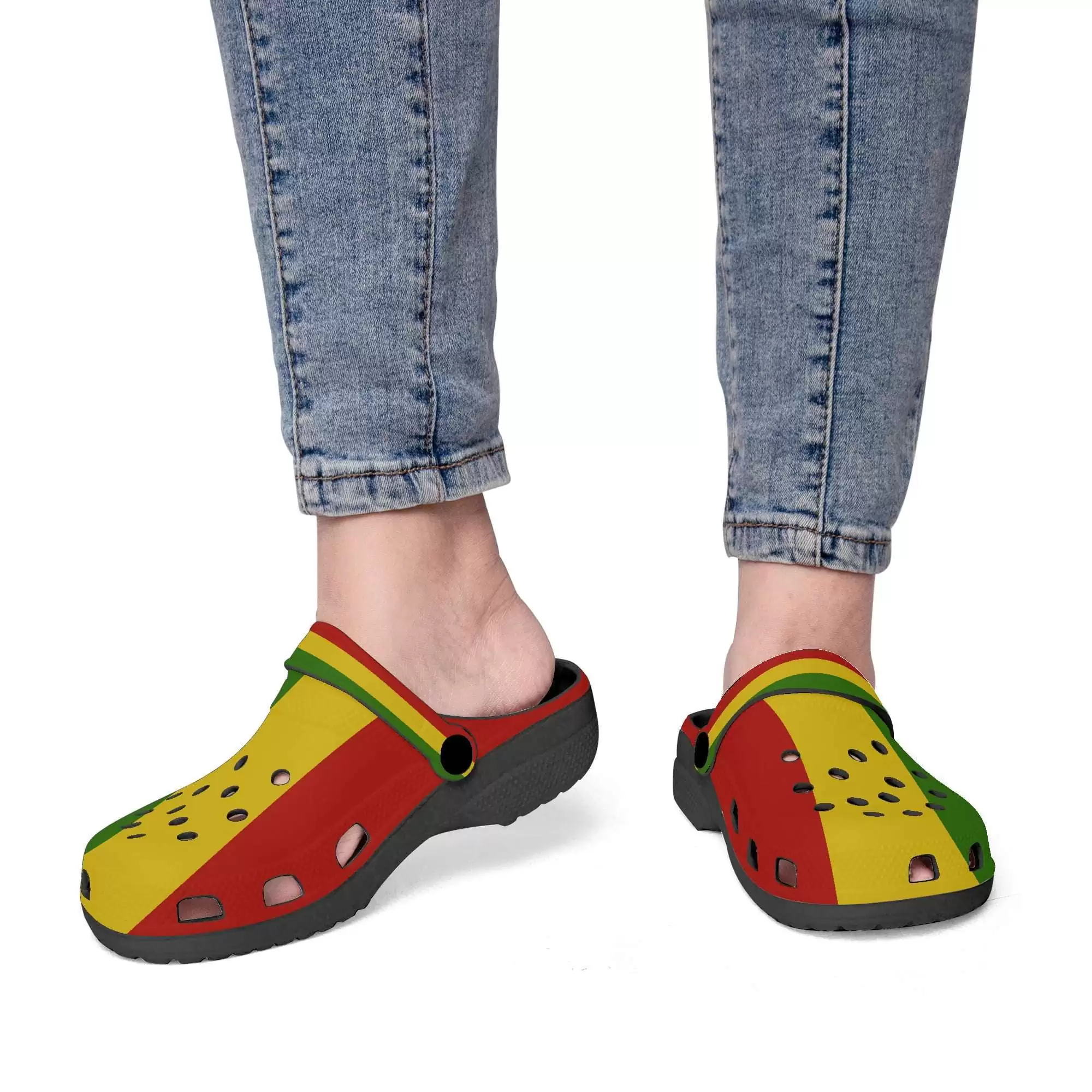 Rasta Clogs in Jamaican Rastafarian colors and with black sole both model view. Great for casual wear as a sandal or flip flop to protect your feet.