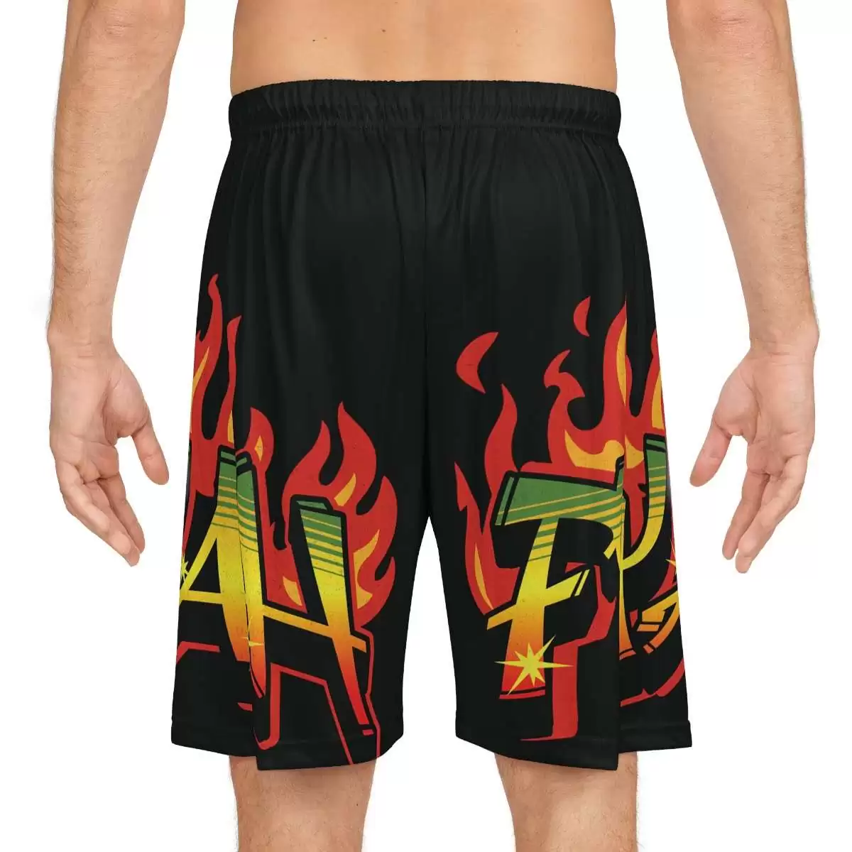 Fyah Basketball shorts back model view in the Rastafarian colors and graffiti design. Rasta Seed Reggae Jamaican merchandise and clothing.