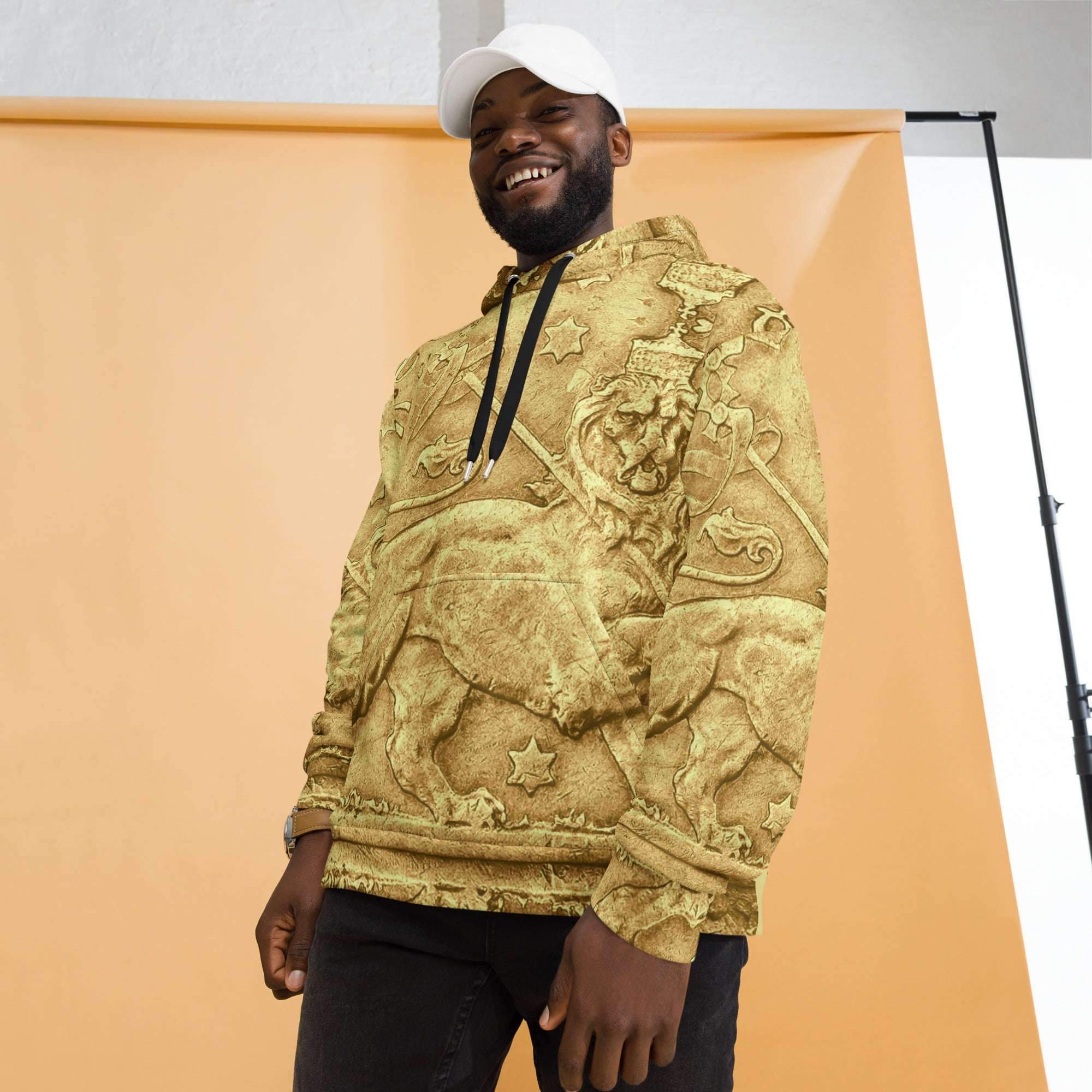Rasta Lion Ancient Amharic Hoodie model view in pullover style. Muted stone color with ancient original print. Rastaseed original Reggae clothing shop.