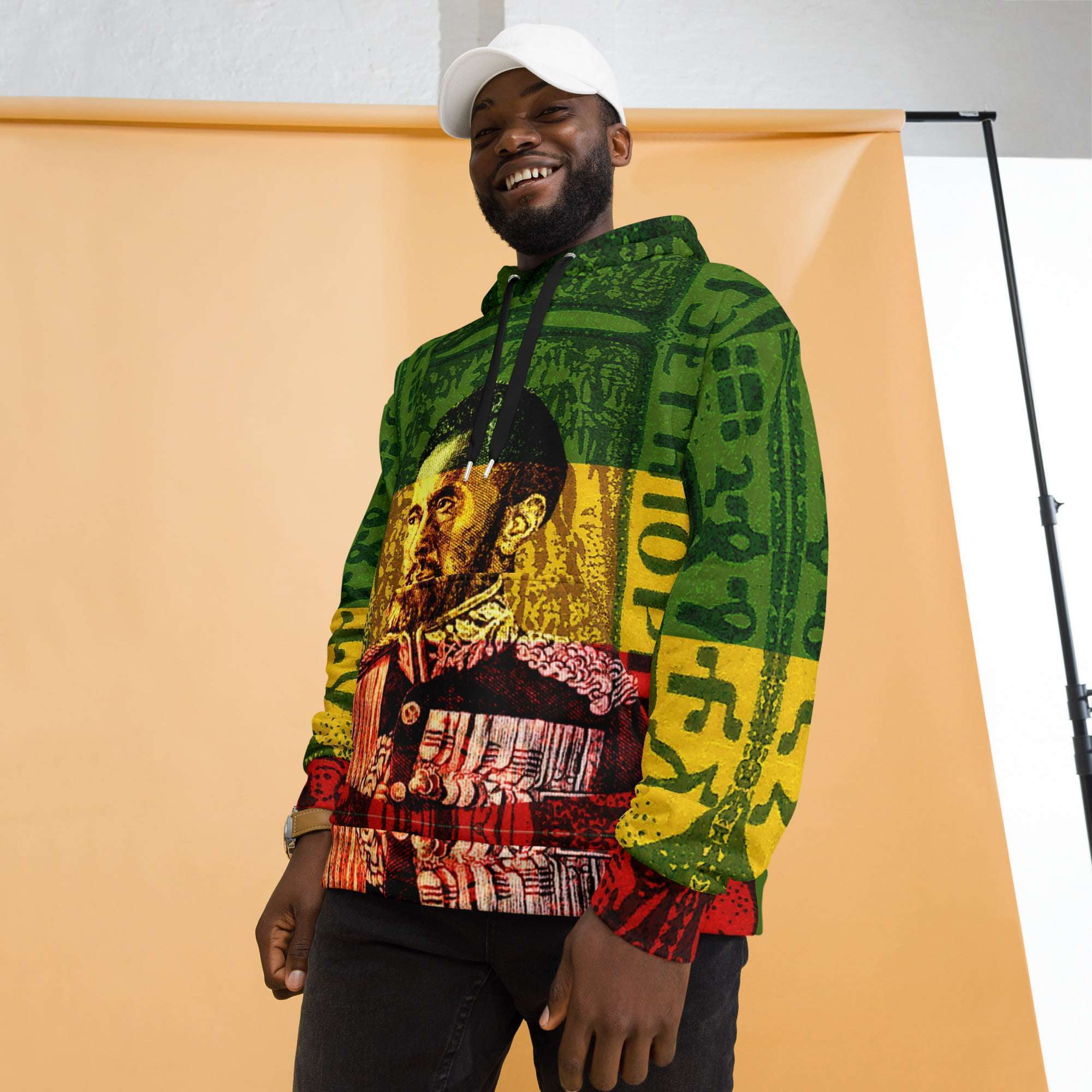 Selassie I Hoodie model view in Rasta colors and a soft cotton feel fabric with fleecy lining, double hoodie and front pocket. Rasta and Jamaican merchandise.