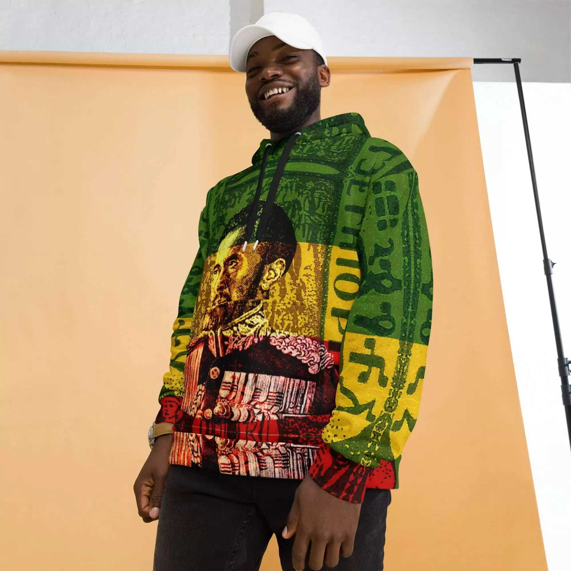 Selassie I Hoodie model view in Rasta colors and a soft cotton feel fabric with fleecy lining, double hoodie and front pocket. Rasta and Jamaican merchandise.