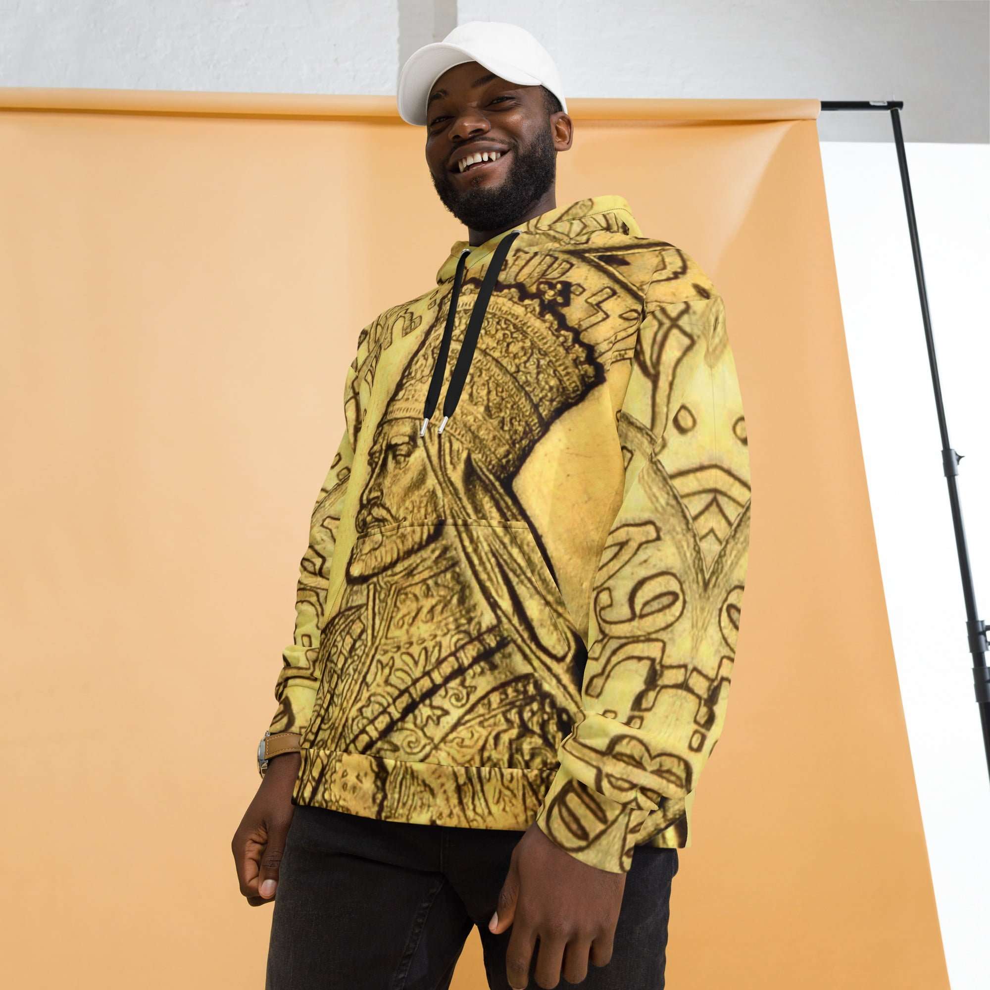 Emperor Haile Selassie Amharic Hoodie model view in cosy cotton feel fabric with fleece lining, double hoodie and front pocket. Rasta clothing and merchandise.