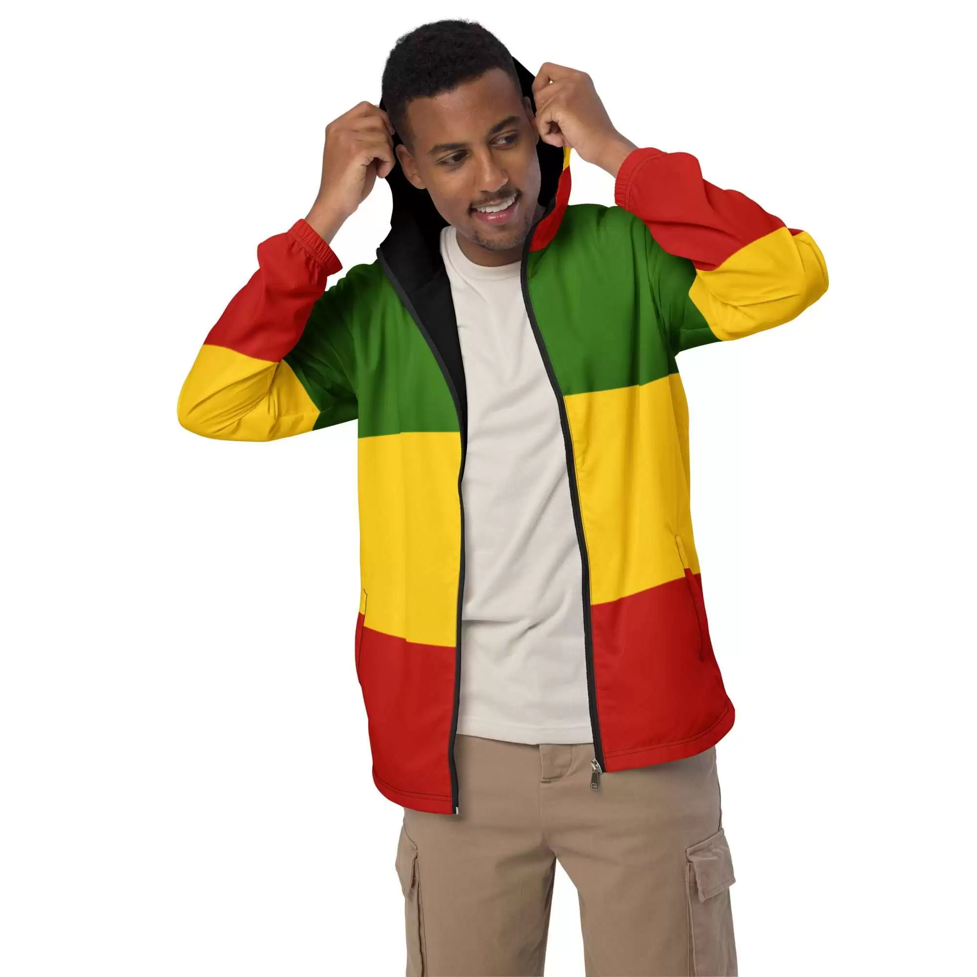 Rasta raincoat front model unzip view in the Reggae Rastafarian colors red gold green and black. Great for unexpected showers at your favourite Reggae Festival.