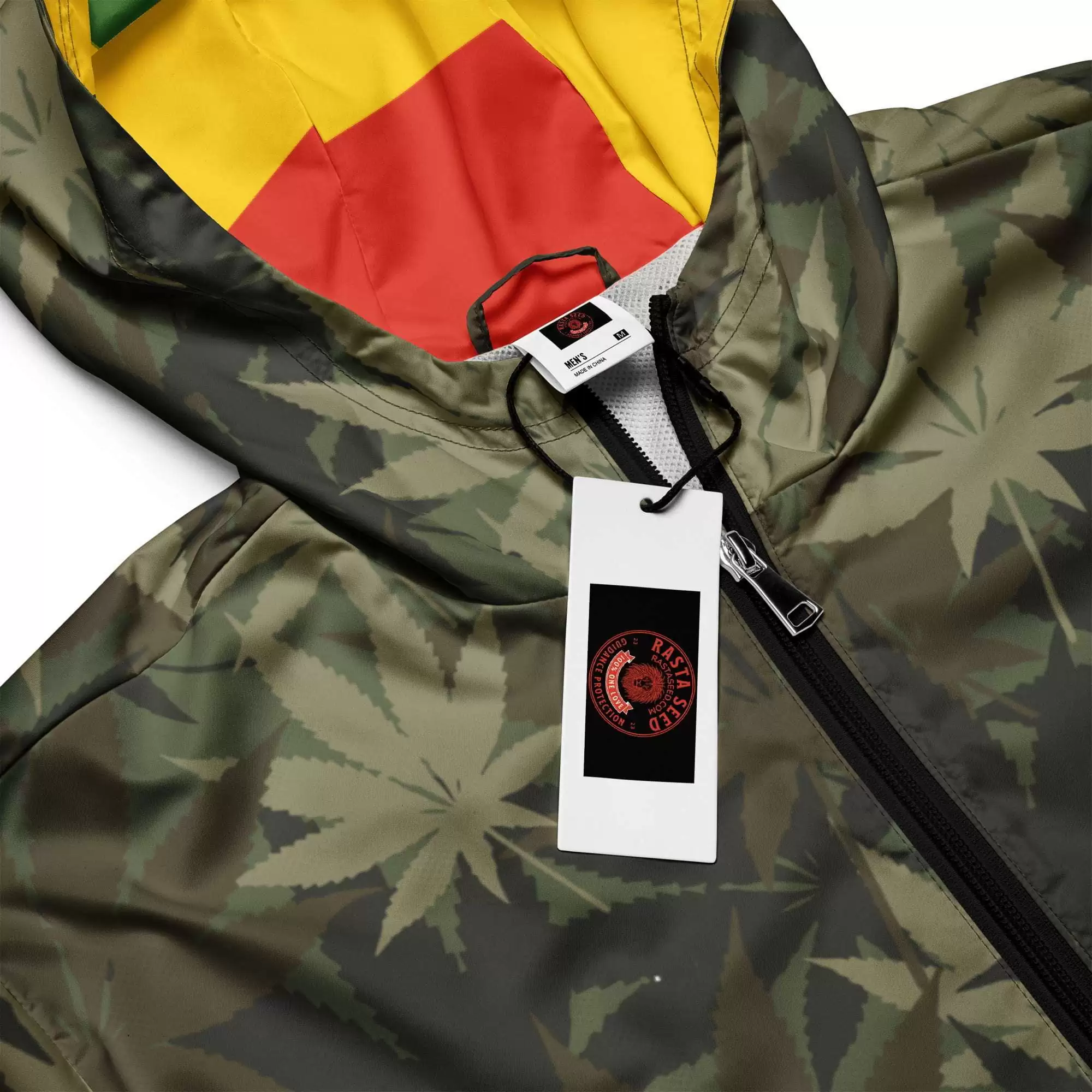 Rasta Hemp Leaf Men’s windbreaker or rain jacket branding label view. Great for that unexpected shower of rain when out and about in the city or country.