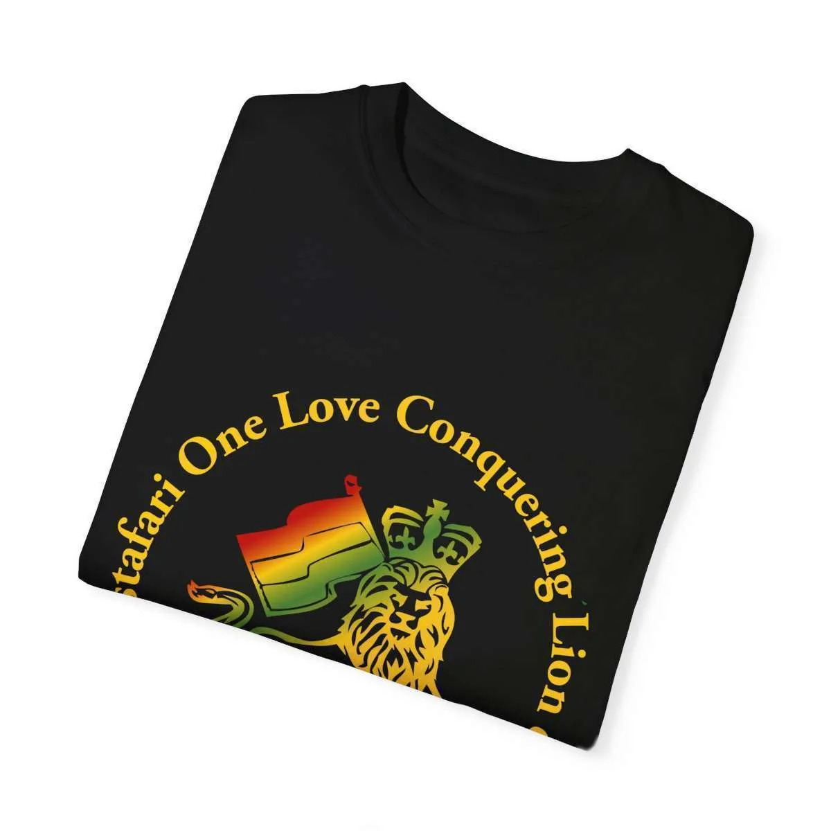 Lion of Judah t shirt folded flat view in Rastafarian colors with circle of text. Quality shirt made from ethical practices in the United States.