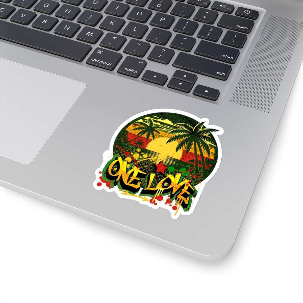Rasta one love stickers white background on computer different sizes kiss cut whitebackground. Reggae Rastafarian colors and Jamaican tropical design and graffiti.