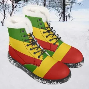 Rasta Fur Lined Leather Boots, non slip sole, unisex design. Great for cold Winter months. Warm up for the snow season. Rastaseed clothing and boots. Front snow view.