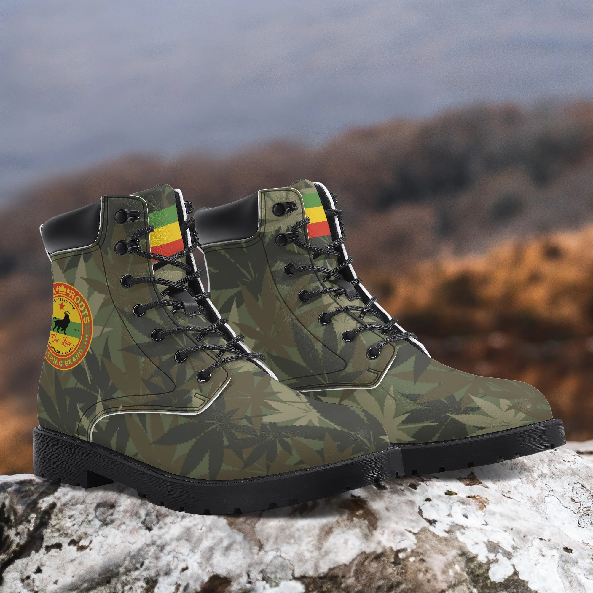 Rasta Gideon Boots in a Hemp Camouflage Pattern with Rasta flag and Lion of Judah trim. Rastaseed original Jamaican clothing shoes and gear. Outside on the beach view.