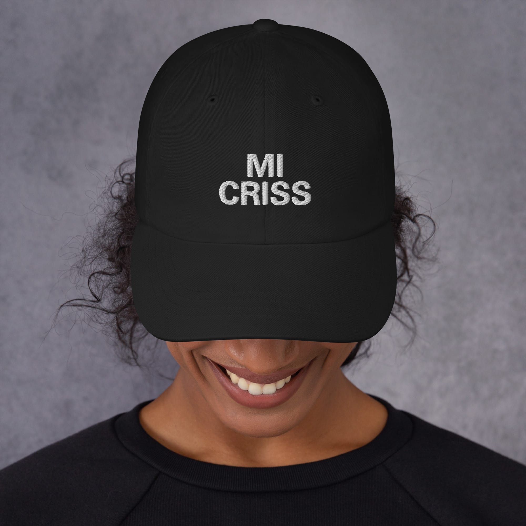 Mi Criss Jamaican Patois Cap front view camo available in khaki camouflage and black dad hat style. Authentic Jamaican merchandise and clothing at Rastaseed. Front black model view.