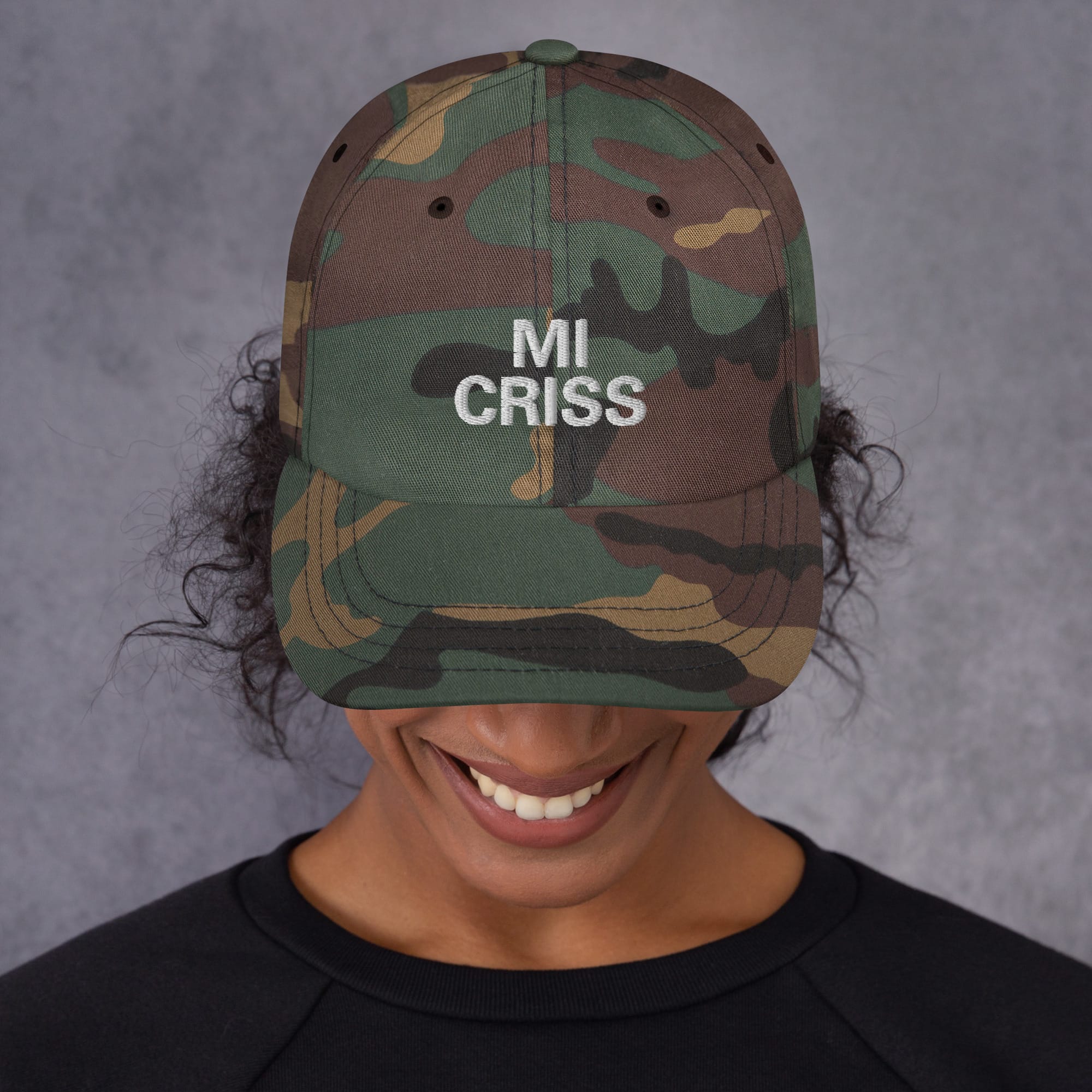 Mi Criss Jamaican Patois Cap front view camo available in khaki camouflage and black dad hat style. Authentic Jamaican merchandise and clothing at Rastaseed. Front Model Camo view
