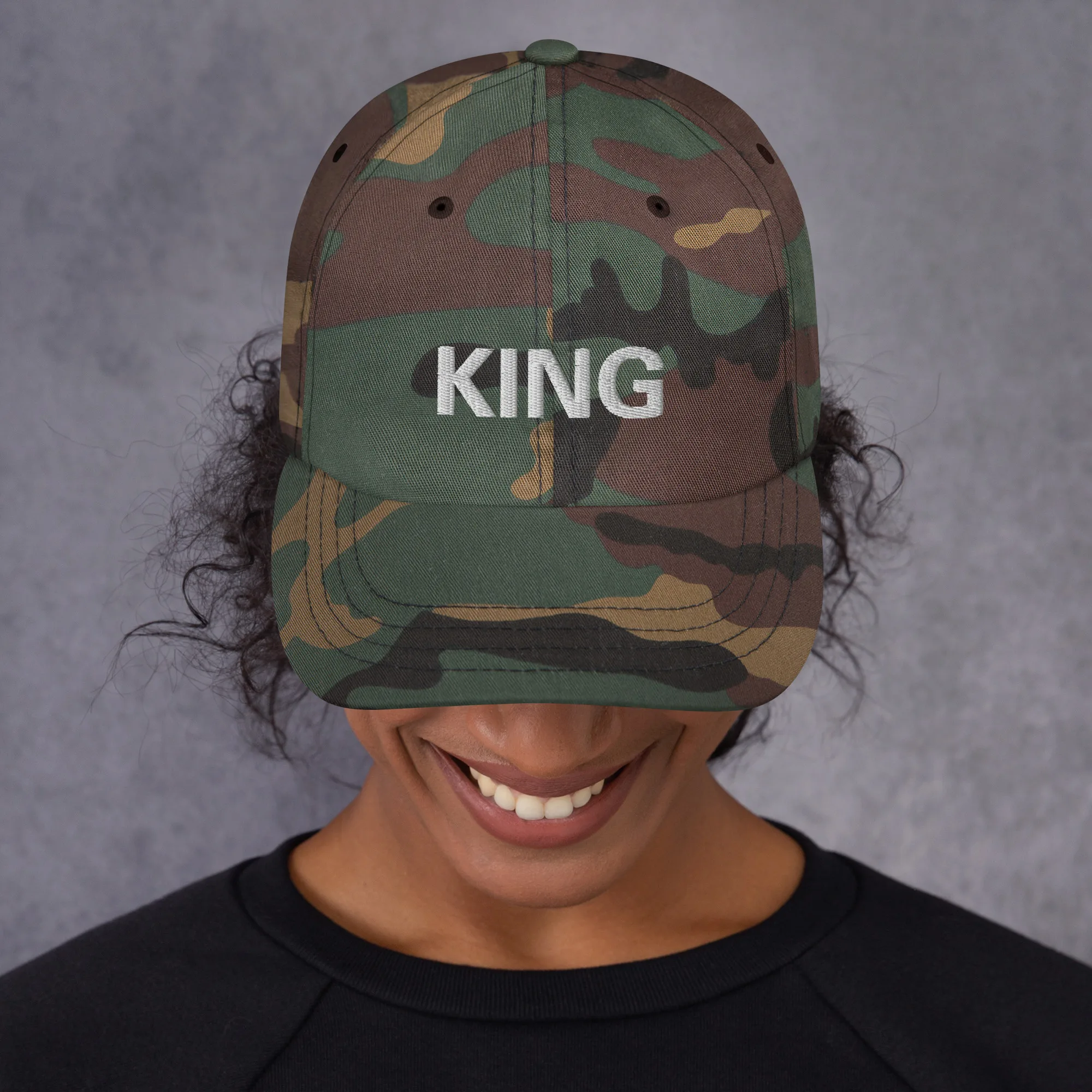 King Rasta Cap in khaki or black. Original Jamaican designs at Rastaseed.com. Reggae gear and original Rastafarian clothing store. Front camo model view.