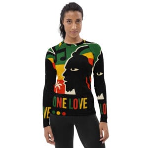 One Love Rasta Rash Guard in red gold green and black. Rastaseed Reggae Surf, Rastafarian and Jamaican merchandise and vacation gear. Model front.